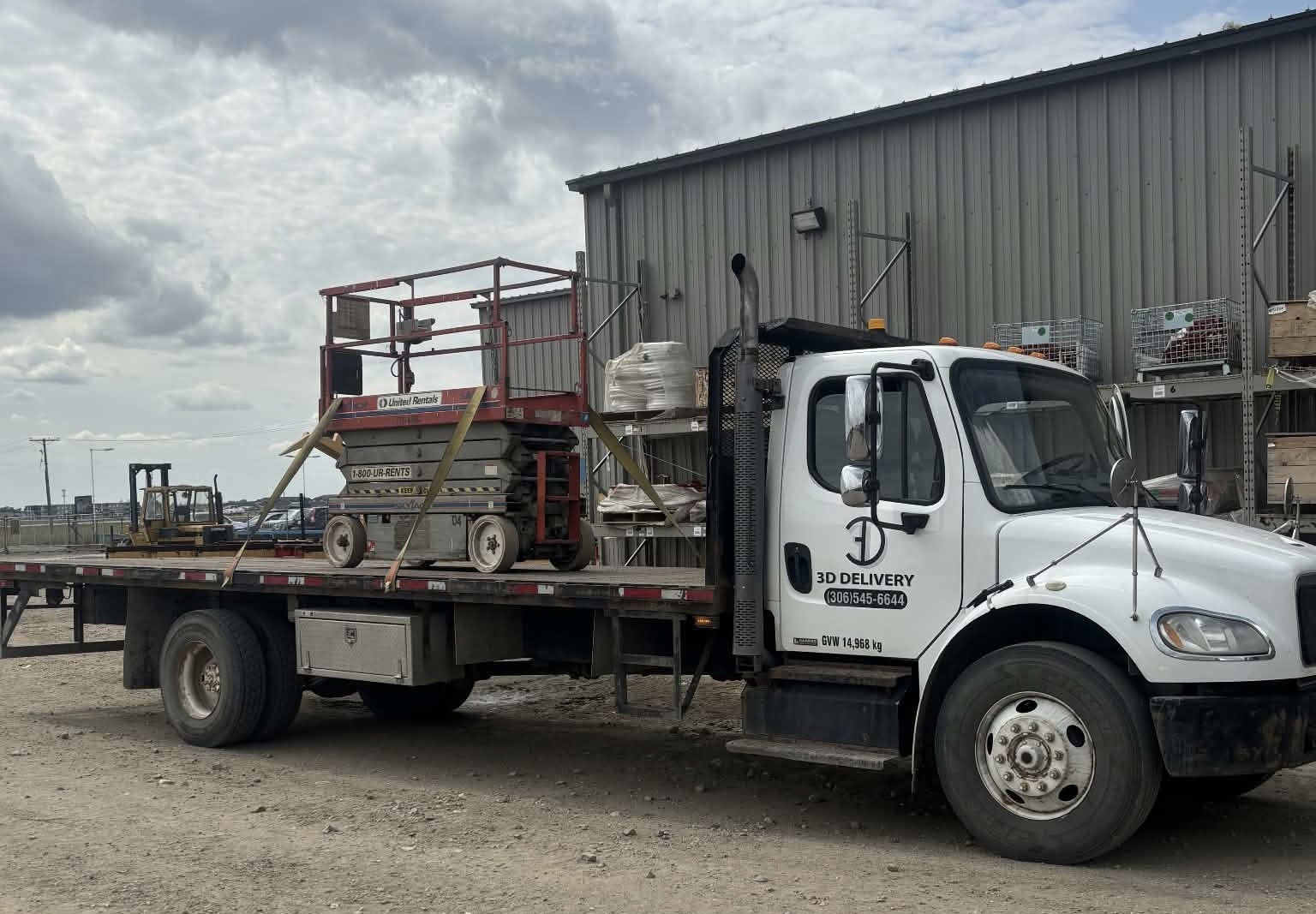 Local equipment delivery truck ready for a job